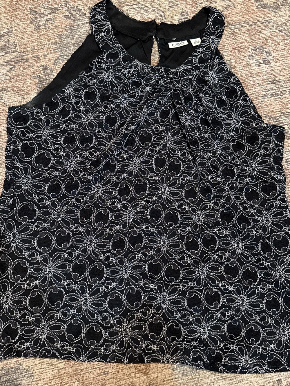 Cato Black Tank with White embroidered flower Detail. Halter neck in size XL.